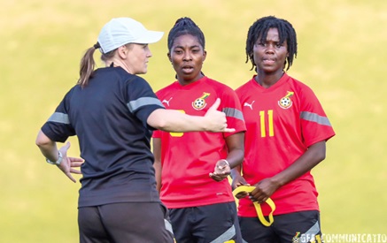 Black Queens coach, Nora Hauptle explaining a point to Jennifer Cudjoe and Ernestina Abambila (right) during the team’s training in Johannesburg last Sunday 