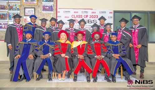 Prof. Kwaku Atuahene-Gima (seated 3rd from right), the Executive Dean, NiBS, and Simon Giger (seated 3rd from left), Swiss Ambassador to Ghana, with other dignitaries and some of the graduands