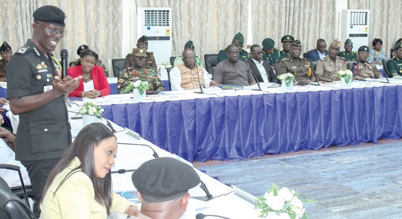 Dr George Akuffo Dampare (left), IGP, addressing the meeting. Wth him are other dignitaries and senior security officials. Picture: ERNEST KODZI