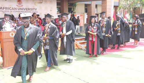 Some graduands of African University College of Communications after receiving their medals and certificates. Picture: ELVIS NII NOI DOWUONA 