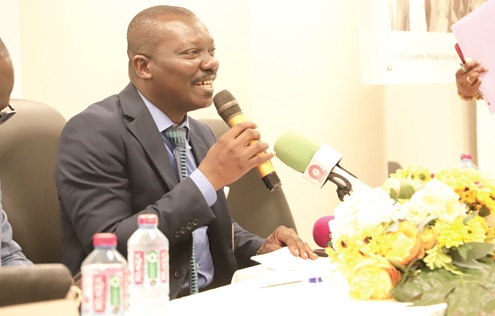 Dr Kwame Anim-Boamah (inset), Director Medical Affairs, University of Ghana Medical Centre, addressing participants in the media briefing. Picture: EDNA SALVO-KOTEY