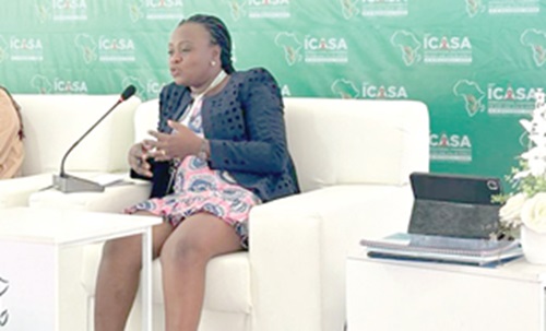 Roberta Araba Amoquandoh (right), HIV Coordinator for Ashaiman Municipal Health Directorate, addressing one of the panel sessions of the ongoing 22nd International Conference on AIDS and STIs in Africa