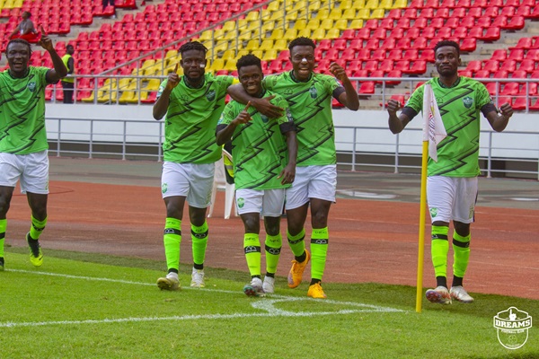 Players of Dreams FC celebrating one of their goals