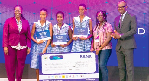 Contestants of OLA Girls SHS with Ursula Owusu-Ekuful (left), Minister of Communications and Digitilisation, and Dr Albert Boasiako-Antwi (right), Director-General of the CSA
