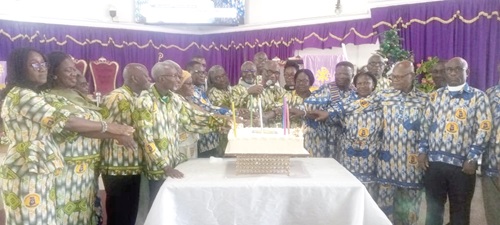 Rt Rev. Samuel Ofori-Akyea (6th from right), Bishop, Tema Diocese of the Methodist Church Ghana, joined by other ministers of the church and members of the anniversary planning committee to cut the 50th anniversary cake