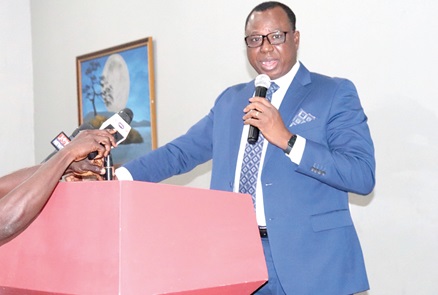 Joseph Whittal (right), Commissioner of the Commission on Human Rights and Administrative Justice, addressing participants  in the event
