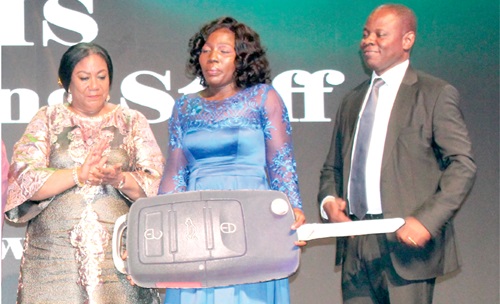 Rebecca Akufo-Addo (left), First Lady, with Egbeegbe Anagbonu (middle), the ultimate award winner, and Dr Patrick Kuma-Aboagye, DG, GHS, after the ceremony
