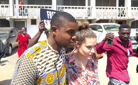 Shalimar Abbiusi (right) being escorted out of court