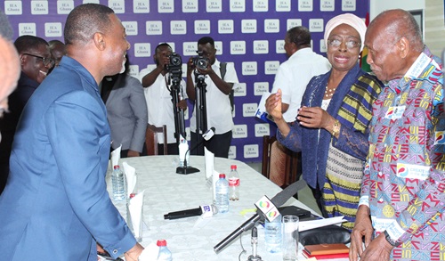 Sophia Akuffo (left), a former Chief Justice of Ghana, interacting with Sam Okudzeto, a Member of the Council of State