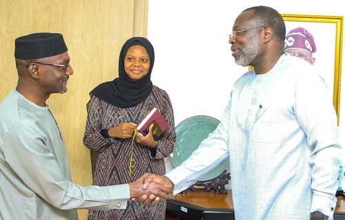 Dr Omar Alieu Touray, President of the ECOWAS Commission (right) welcoming Mr Moustapha Traore, the Ambassador and Permanent Representative of Mali to ECOWAS