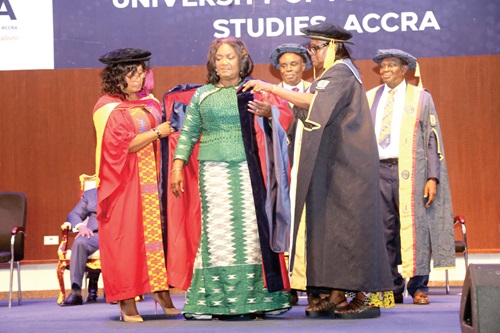 Georgina Theodora Wood (2nd from left), former Chief Justice, being decorated