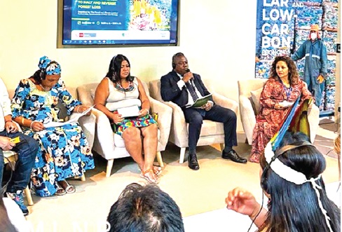 John Allotey (2nd from right), Chief Executive of Ghana’s  Forestry Commission, speaking at the Peruvian forum at COP28 