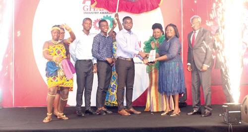 Gertrude Torkornoo (2nd from right), Chief Justice, presenting the ultimate award to a representative of KEDA Ghana Ceramics Company Limited. With her is Kobina Tahir Hammond (right), Minister of Trade and Industry, and some officials of KEDA Ghana. Picture: ERNEST KODZI