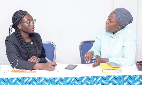 Sadiatu Issah (right), aspiring Assembly Member for New Weija East Electoral Area, speaking to Juliet Akyaa Safo, a Senior Reporter of the Daily Graphic