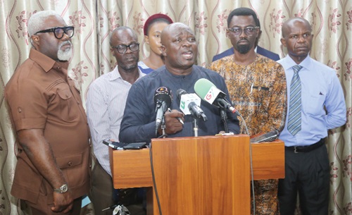 Asare Konadu Yamoah (middle), President of the Ghana Publishers Association, addressing a press conference after the annual general meeting in Accra.  Picture: SAMUEL TEI ADANO