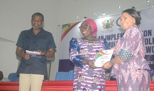 Dzifa Gomashie (middle), a former Deputy Minister of Tourism, presenting a copy of the plan to a representative from the Ministry of Tourism, Arts and Culture. Looking on is Mark Okraku Mantey (left), the Deputy Tourism Minister. Picture: ALBERTA MORTTY