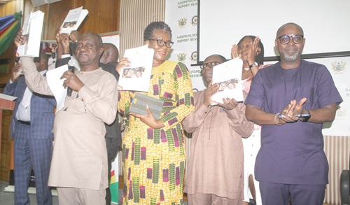 From left: Prof. George Gyan-Baffour, Chairman, National Development Planning Commission; Dr Leticia Adelaide Appiah, Executive Director, National Population Council; Prof. Stephen O.Kwankye, Regional Institute of Population Studies, and other dignitaries launching the Ghana Review Report  at the Accra International Conference Centre. Picture: ESTHER ADJORKOR ADJEI