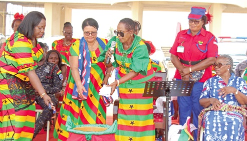 Dr Dorothy Danso (right), Aglow National President, and Gertrude Torkornoo (left), Chief Justice, presenting their thanksgiving offering at the service. With them are other officials of the fellowship. Picture: ERNEST KODZI