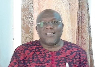 Seth Kwame Acheampong (right), Eastern Regional Minister, addressing participants in the RCC meeting in Koforidua