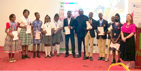 The recipients of the Outstanding Pearson Learners awards with Christine Evans (right), Business Development Manager of Pearson Africa, and Grant Bulmuo (middle), Education Consultant