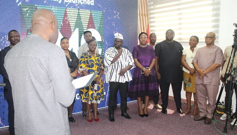 Kojo Oppong Nkrumah (left), Minister of Information, inaugurating the Local Organising Committee for the 3rd African Media Convention into office.  Picture: ESTHER ADJORKOR  ADJEI