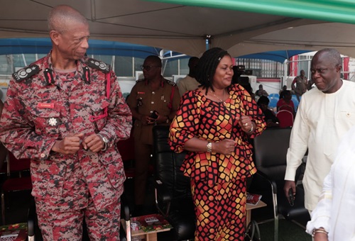 Kwame Anyimadu Antwi (right), Council Chairman, Ghana National Fire Service explaining a point to Doreen Annan (2nd from right), Acting Chief Director, Ministry of the Interior during the event. With them is Julius Kuunuor (left), Chief Fire Officer, Ghana National Fire Service.