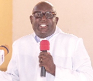 Very Rev. Samuel L. Lamptey (inset) preaching the Christmas message. Picture: Caleb Vanderpuye