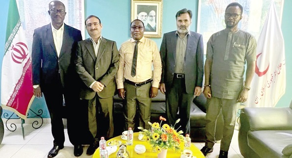 Kwame Gyimah-Akwafo (left), President of the Ghana Red Cross Society, with Dr Seyed Mohammad Ali Salahatpour (2nd from left), Medical Director of Iran Clinic in Ghana, and some officials of the Red Cross Society and staffs of the Iran Clinic in Ghana