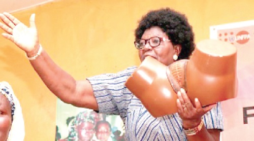 Gertrude Eunice Maasodong, President of the Association of Ghanaian Women and Children’s Welfare,  displaying how the practice is carried out with a dummy