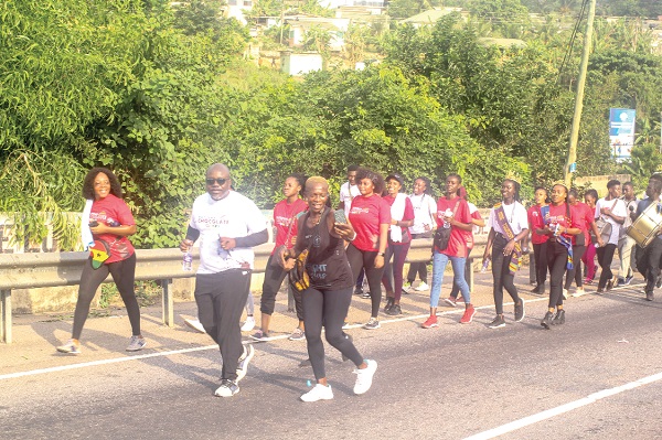 Patrons walk to promote cocoa products