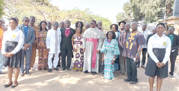 The old students, including Most Reverend Professor Paul Boafo (5th from right), the Presiding Bishop of the Methodist Church, Ghana  INSET:  The water system 