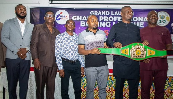 The Minister of Youth and Sports, Mustapha Ussif (2nd from right), flanked by officials of the GBA and Imax Promotions, holding one of the title belts to be competed for