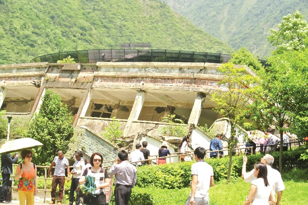 A collapsed building of the Junior High School at Yingxiu Town is now a memorial site 