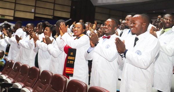 The newly qualified Physician Assistants applauding after  they have been inducted into office in Accra