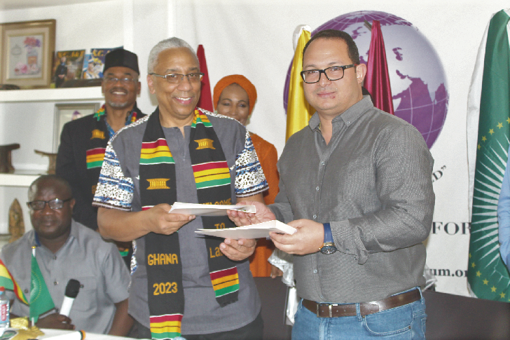  John Sampson (left), Associate Professor of Anesthesiology and Critical Care Medicine at the Johns Hopkins University, exchanging the contract with Bishoy Fouad, the Managing Director of Life Care Technology Ghana Ltd.  Picture: ESTHER ADJORKOR ADJEI