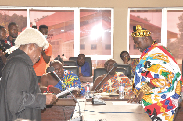 Togbega Sei II (right), Paramount Chief of Botoku, being inducted into the House by Justice Yaw Owuawu Acheampong