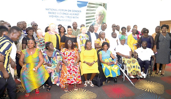 Some members of the Ghana Federation of Disability Organisations and other officials  after the meeting. Picture: GABRIEL AHIABOR