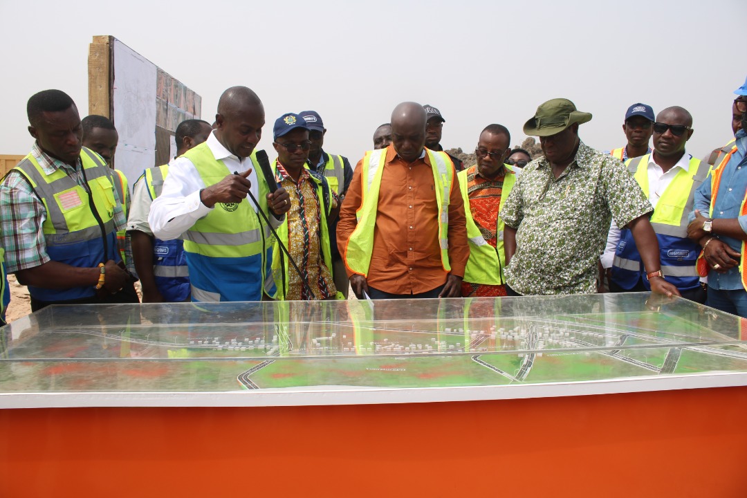  The Mr Amoako-Atta (wearing a hat) inspecting the quality control laboratory set up by First Sky Construction at the Kitase site. With him are Alhaji Abass Awulo (3rd from right), the Chief Director of the ministry, and other officials of the Ghana Highway Authority and the Department of Urban Roads. Pictures: DELLA RUSSEL OCLOO