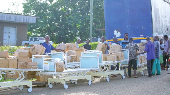 Representatives of the beneficiary hospitals inspecting the equipment after receiving them