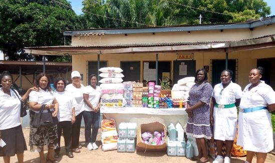 Francisca Ntow ( 3rd from right), a Senior Nursing Officer in Charge of Public Relations at the Hospital, receiving the assorted items from Nermine Kattah, (5th from left), president, GWIC. Looking on are some members of the club