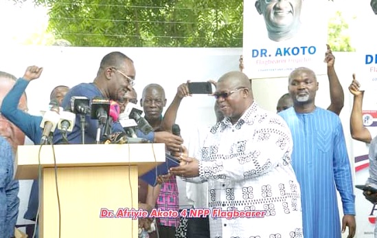 Flashback: Kenwuud Nuworsu (right) presenting the nomination forms to Dr Owusu Afriyie Akoto, NPP presidential aspirant