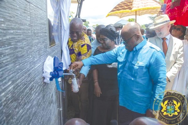 • President Akufo-Addo opening the tap after commissioning the Upper East Water Supply System in Navrongo last year