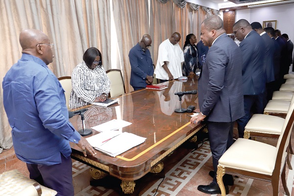 Dr Stephen Yenusom Wengam (right) and the leadership of the Assemblies of God Church  praying for President  Akufo-Addo at the Jubilee House in Accra. Picture: SAMUEL TEI ADANO