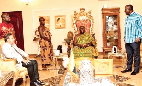 Alan Kwadwo Kyerematen (right) briefing the Asantehene, Otumfuo Osei Tutu II. Seated on the right of Otumfuo is Pière Laporte, World Bank Country Director