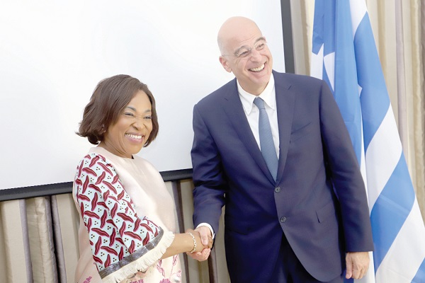 Shirley Ayorkor Botchwey (left), Minister of Foreign Affairs and Regional Integration, in a handshake with Nikos Dendias, Greece Foreign Affairs Minister, after a meeting at the ministry in Accra. Picture: SAMUEL TEI ADANO