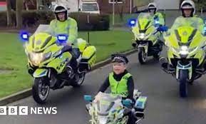 Five-year-old joins police bike ride along