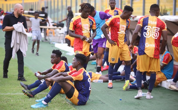 A dejected Hearts of Oak team after the end of the game
