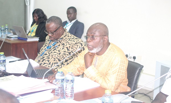 James Klutse Avedzi (right), Chair, Public Accounts Committee (PAC), making some comments at the meeting. With him is Samuel Atta Mills, Vice Chair, PAC. PICTURE: MAXWELL OCLOO