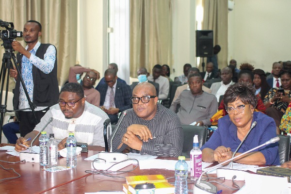 Samuel Adjidjonu (middle), Deputy Managing Director, Operations and Engineering, Electricity Company of Ghana, responding to questions at the Public Accounts Committee sitting. With him are Ebenezer Baiden (left), General Manager, Energy Acquisition and Risk Management, ECG, and Esther Walter-Quaye, Director, Finance, ECG. Picture: MAXWELL OCLOO