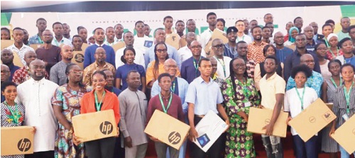 Prof. Rita Akosua Dickson (4th from right), Vice-Chancellor, KNUST, and some dignitaries as wellas beneficiaries after they received the free brand new laptops. Picture: EMMANUEL BAAH